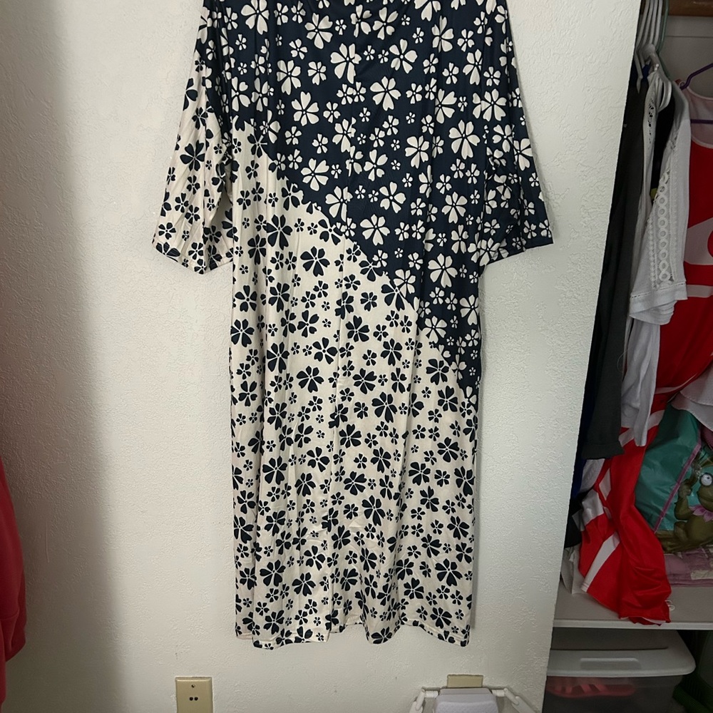 Blue & White Flowers decorate this nice dress or swimsuit cover up.